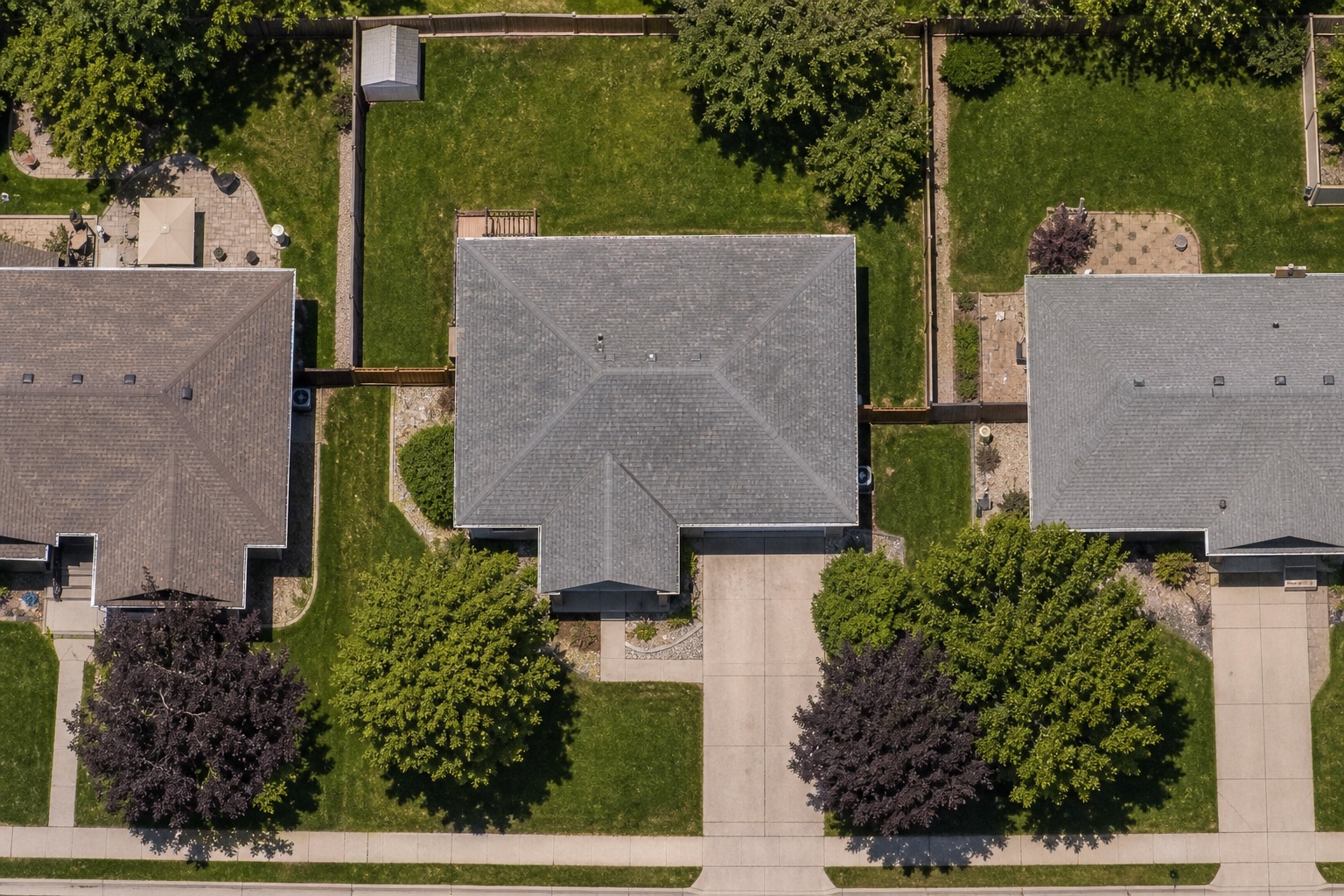 Aerial view of a residential property before its roof was replaced
